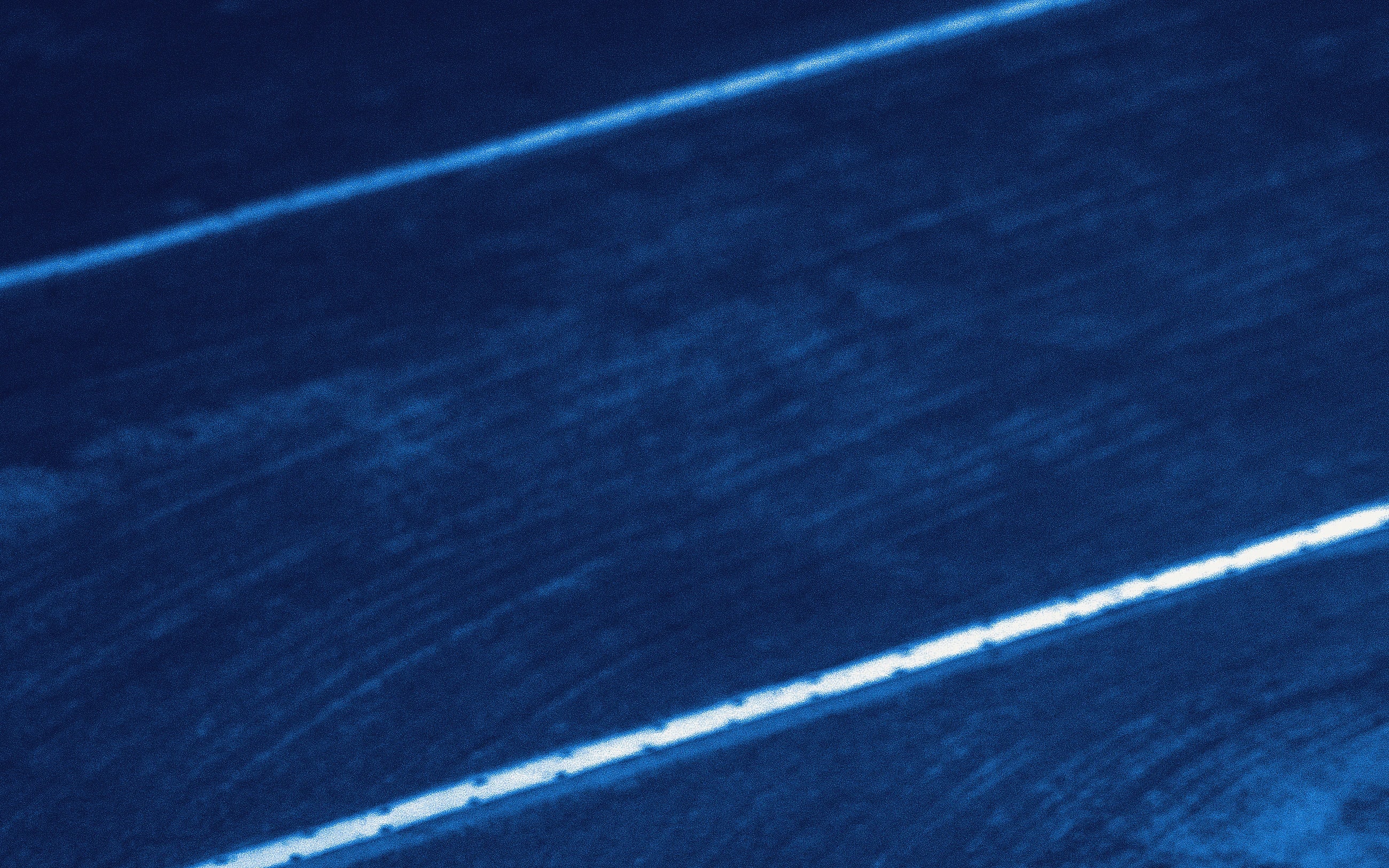 A single white line running across a dark blue court surface.